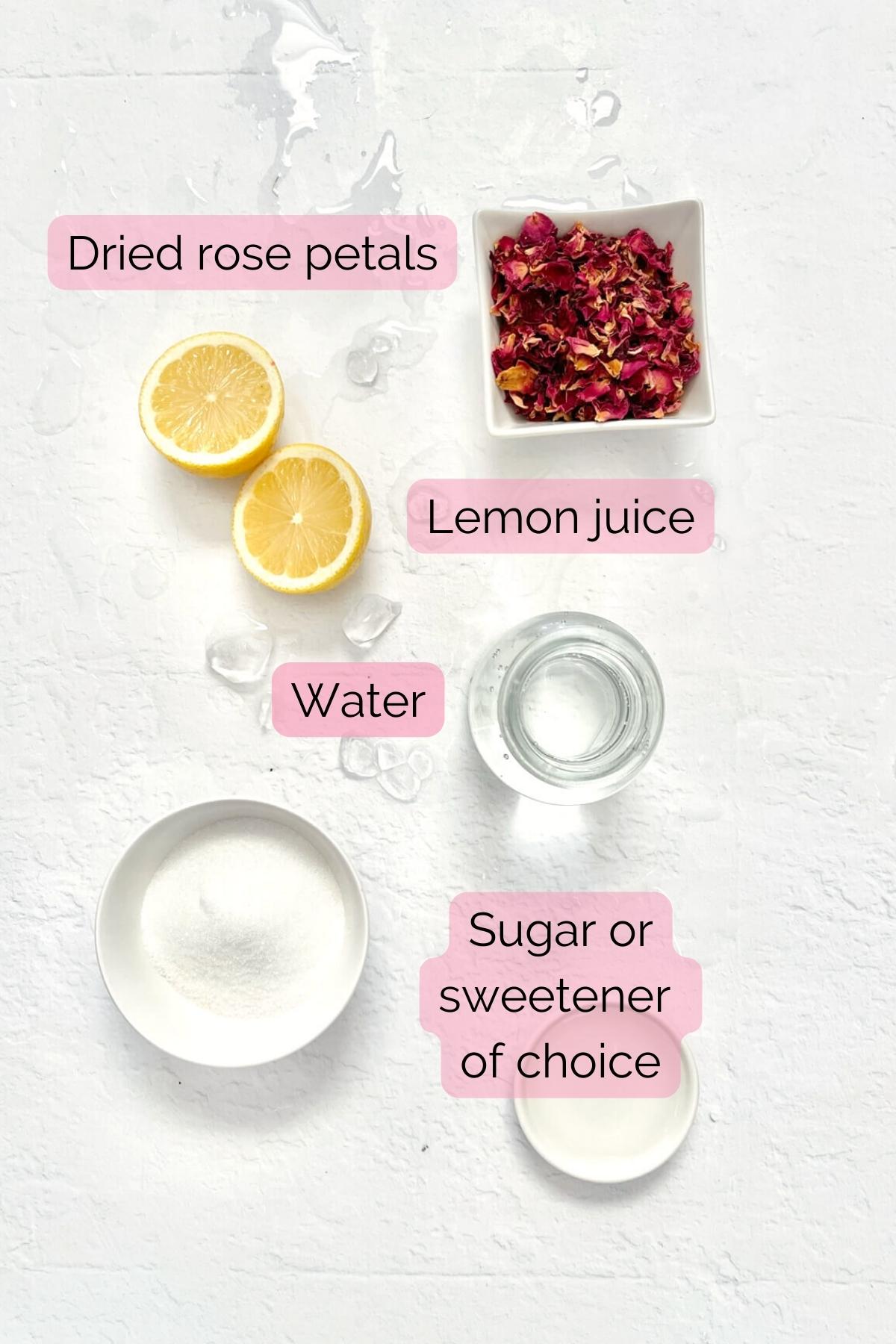 image of ingredients for rose lemonade including dried rose petals, lemon, water and sugar.