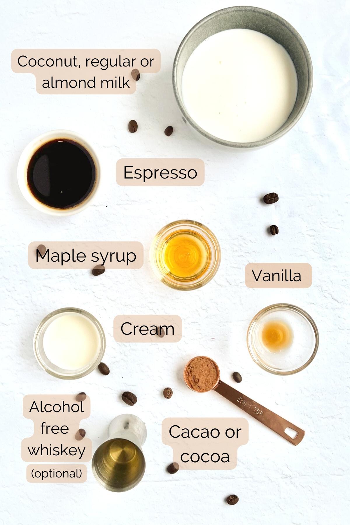 birdseye view of non-alcoholic baileys ingredients including milk espresso maple syrup vanilla cream and cocoa