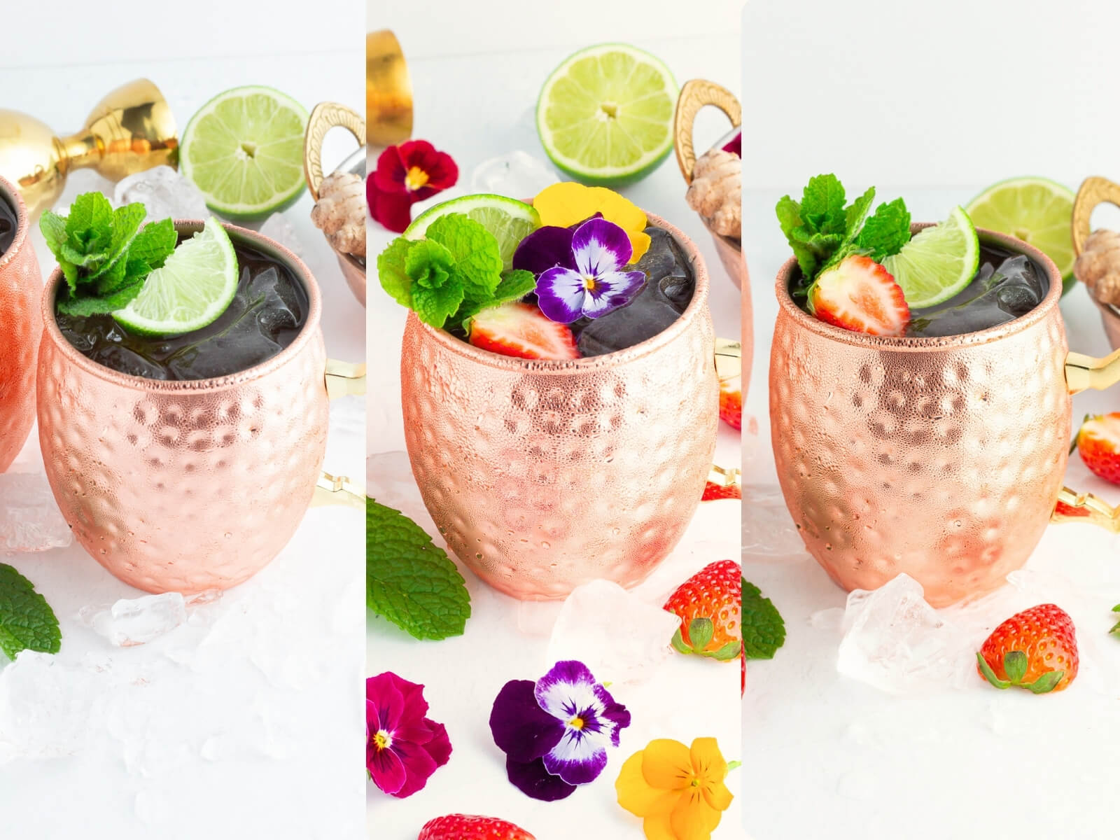 Two copper mugs filled with ice, mint, lime slices, strawberries, and edible flowers showcase a refreshing Moscow mule mocktail. On the white surface, ice cubes, strawberries, lime slices, and flowers are artfully scattered around.