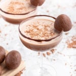 chocolate mocktail in a coupe glass with Easter egg garnish