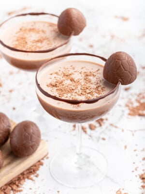 chocolate mocktail in a coupe glass with Easter egg garnish