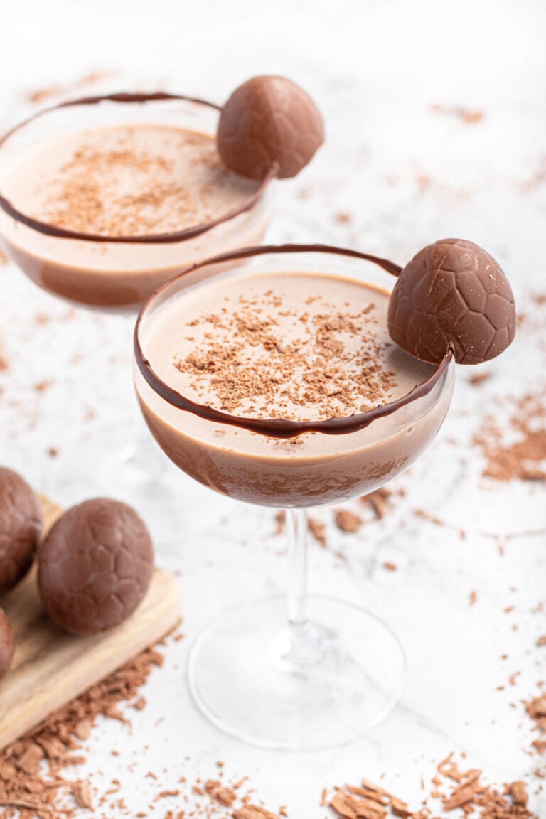 chocolate mocktail in a coupe glass with Easter egg garnish