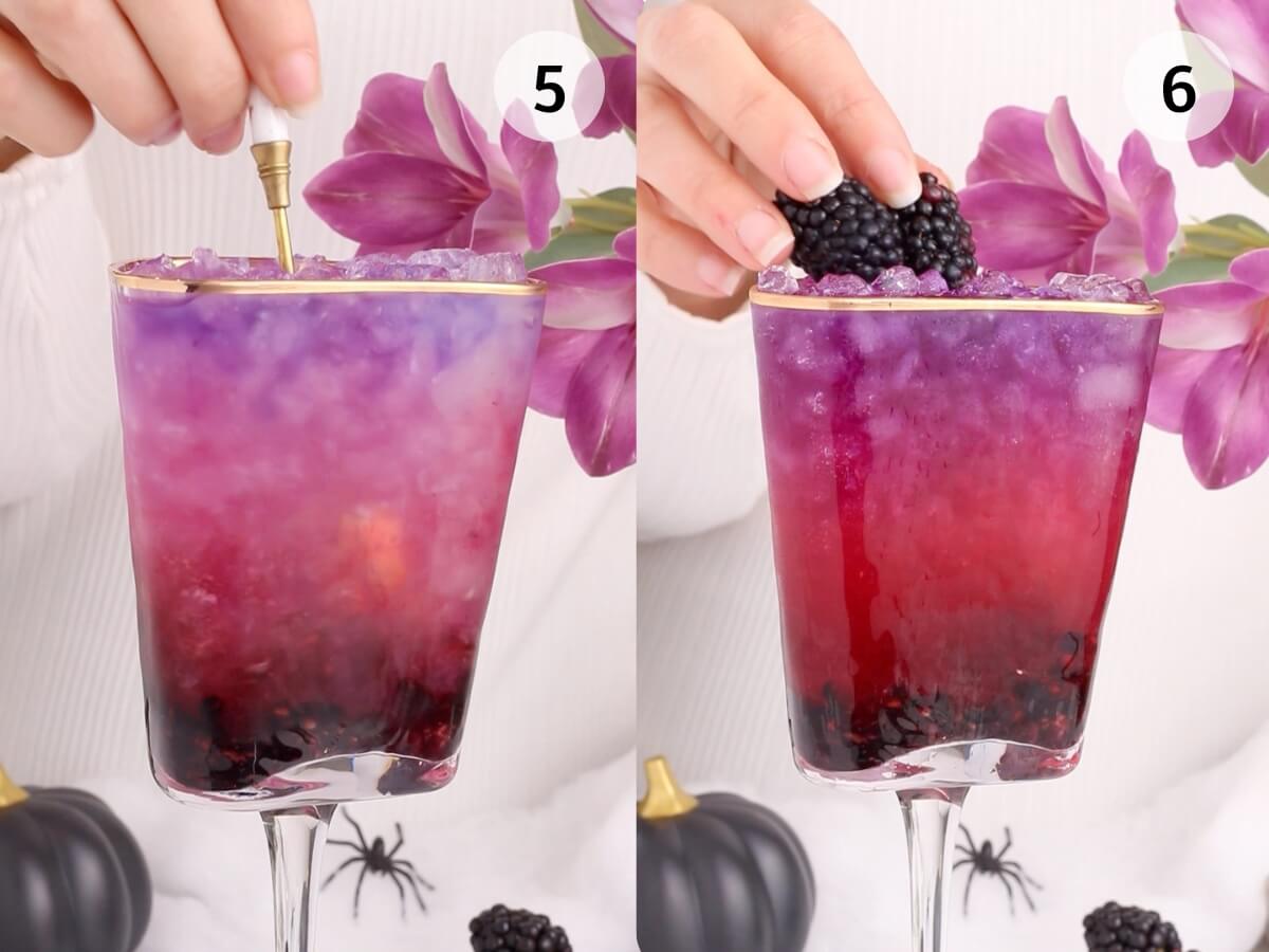 Two side-by-side images show a hand preparing a layered purple and pink drink in a glass with gold trim. The left image shows a dropper; the right image adds blackberries on top. Purple flowers and Halloween dรฉcor are in the background.