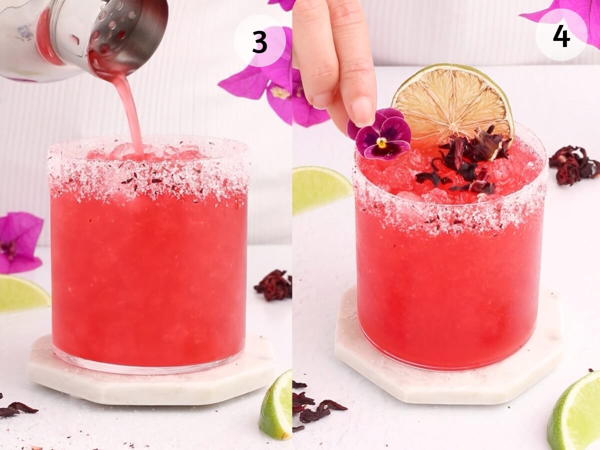 A vibrant pink grapefruit mocktail is poured into a salt-rimmed glass (left). On the right, a hand garnishes the drink with a dried lime slice, purple flower, and hibiscus petals. Lime wedges and flowers are nearby.