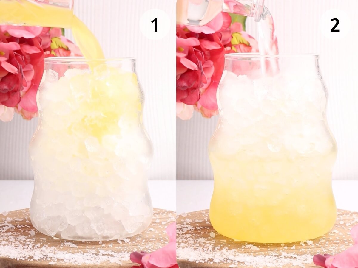 Two side-by-side images of a glass filled with crushed ice in front of pink flowers; image 1 shows yellow liquid being poured in, and image 2 shows clear liquid being poured on top. Both labeled with numbers 1 and 2.