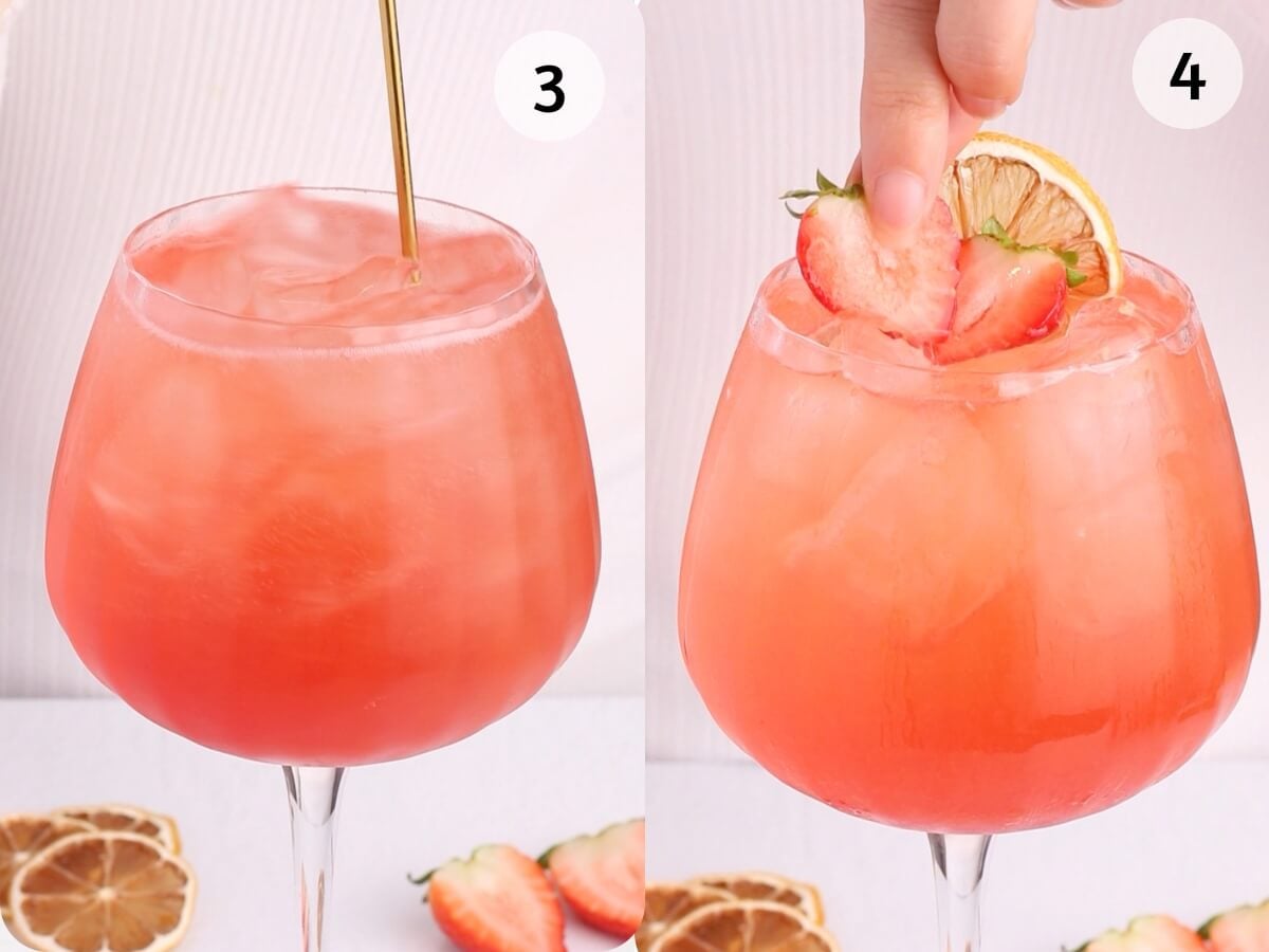Two images of a pink iced drink in a large glass; the first shows a hand stirring with a gold spoon, the second shows a hand garnishing with a strawberry slice and a dried lime slice. Sliced fruit is visible on the table.
