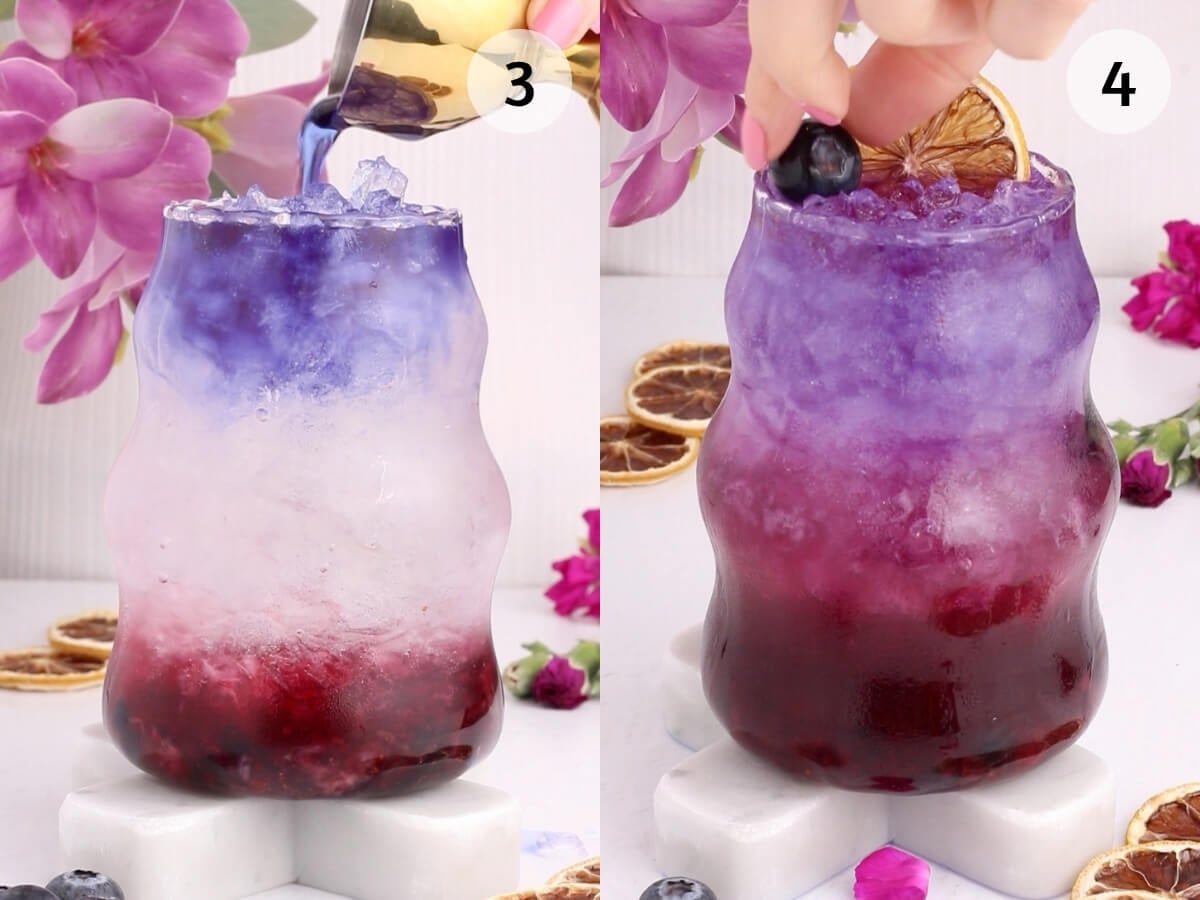 A two-panel image shows a layered purple and red iced drink. In panel 1, blue liquid is being poured over ice; in panel 2, a hand adds a blueberry and a dried citrus slice on top. Pink flowers are in the background.