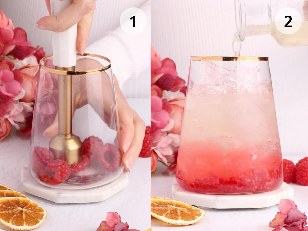 Two-step collage: On the left, raspberries are being mashed in a glass with a hand blender. On the right, the glass contains mashed raspberries and ice while a clear liquid is being poured in. Pink flowers and dried orange slices are nearby.
